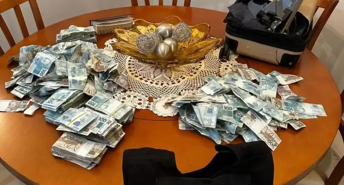 Homem que jogou dinheiro da sacada não era alvo da PF