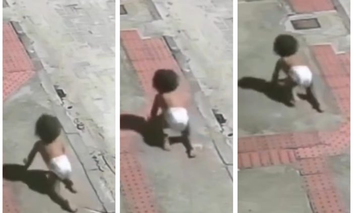 Vídeo: bebê engatinha em avenida de madrugada e escapa da morte